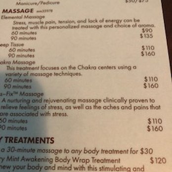 Acqua Aveda Salon and Spa - Price of massage on their brochure at the check-in and check-out desk - Day Spas Near Me - Holmes Beach, Florida