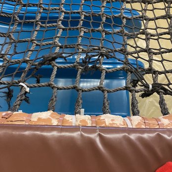 Dizzy Castle - Torn safety net that kids walk over. - Venues & Event Spaces Near Me - Vancouver, Washington