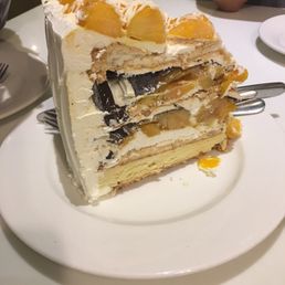 This cake is life! Mango chocolate cake...forgot the name but it's a "must-try" on the menu :) This cake is life! Mango chocolate cake...forgot the name but it's a "must-try" on the menu :)