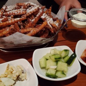 Photo of Dan Sung Sa - Oakland, CA, United States. Sweet potato fries. Didn't know it comes with sugar so next time we're going to tell them without it.