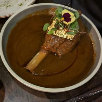Saffron Modern Indian Dining - 24 Carat Lamb Shank - Indian Near Me - Milwaukee, Wisconsin Saffron Modern Indian Dining - 24 Carat Lamb Shank - Indian Near Me - Milwaukee, Wisconsin
