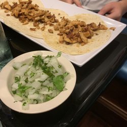 La Catrina - Chicken street tacos with onion, lime, cilantro on the side.