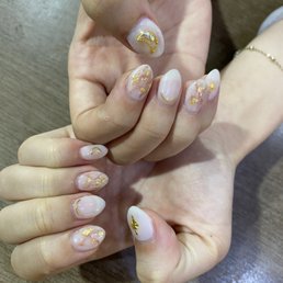 The star on one thumb was $2, the moon with gems was $5, all other gold accessories were $1. The star on one thumb was $2, the moon with gems was $5, all other gold accessories were $1.