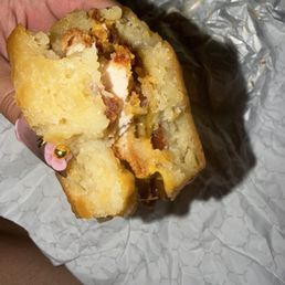 Chicken biscuit sandwich with cheese and beef bacon added