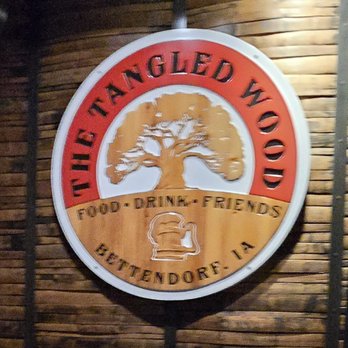 The Tangled Wood - Sign at entrance - Gastropubs Near Me - Bettendorf, Iowa The Tangled Wood - Sign at entrance - Gastropubs Near Me - Bettendorf, Iowa