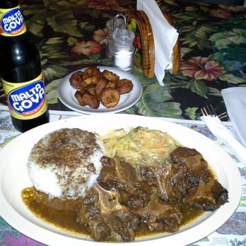 Negril Caribbean Restaurant - Oxtail, white rice, cabage, plantains and Malta - Caribbean Near Me - Junction City, Kansas Negril Caribbean Restaurant - Oxtail, white rice, cabage, plantains and Malta - Caribbean Near Me - Junction City, Kansas