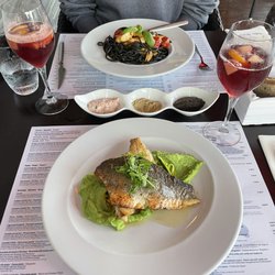 Palm Beach Restaurant - Sea bass (front plate) Linguini seafood pasta (back plate)