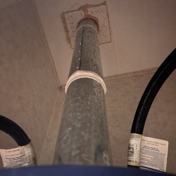 Enhanced Innovative Solutions - The last person to install this water heater didn't even have it connected properly to the air ventilation - Heating & Air Conditioning/HVAC Near Me Enhanced Innovative Solutions - The last person to install this water heater didn't even have it connected properly to the air ventilation - Heating & Air Conditioning/HVAC Near Me