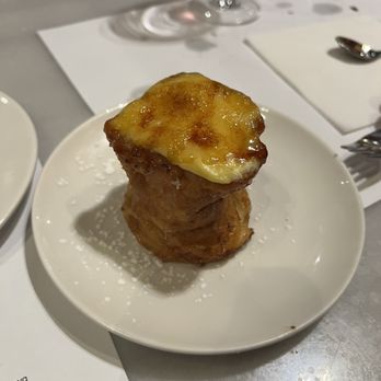 Ciutat Comtal - Yummy desert on their regular menu, light pastry filled with custard (not too sweet either). Delicous. - Tapas Bars Near Me - Barcelona, B Ciutat Comtal - Yummy desert on their regular menu, light pastry filled with custard (not too sweet either). Delicous. - Tapas Bars Near Me - Barcelona, B