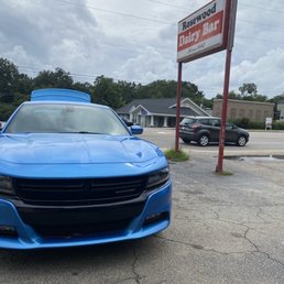 the front of a blue dodge charger the front of a blue dodge charger