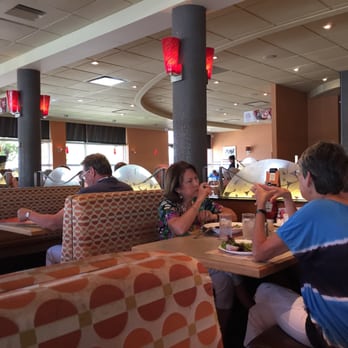 Normandin - a group of people eating in a restaurant - Burgers Near Me - Quebec City, Quebec Normandin - a group of people eating in a restaurant - Burgers Near Me - Quebec City, Quebec