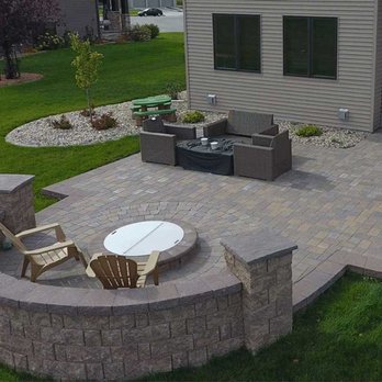 Oasis Landscapes - a patio with a fire pit - Landscaping Near Me - West Fargo, North Dakota Oasis Landscapes - a patio with a fire pit - Landscaping Near Me - West Fargo, North Dakota