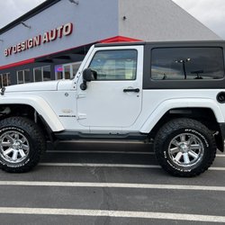 By Design Auto Group - Lifted Jeep
