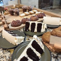 Pastry case with scones, seasonal cake, and many more delicious treats. Pastry case with scones, seasonal cake, and many more delicious treats.