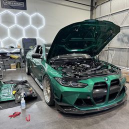 Vile Motorsports doing a trunk swap for me and some engine work.