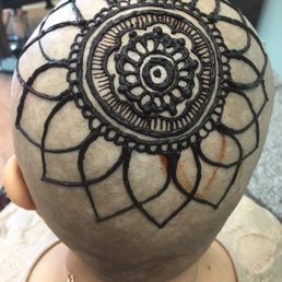 Getting a masterpiece done on my head by Kapi...my first time here and I'm so impressed!