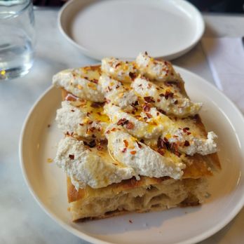 Fossetta - Whipped ricotta and hot honey focaccia - Italian Near Me - New York, New York Fossetta - Whipped ricotta and hot honey focaccia - Italian Near Me - New York, New York