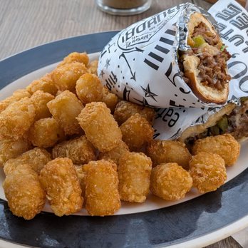 The Corner Pub and Grill - Philly cheese sandwich with provolone. and side of tater tots. - American Near Me - Valley Park, Missouri The Corner Pub and Grill - Philly cheese sandwich with provolone. and side of tater tots. - American Near Me - Valley Park, Missouri