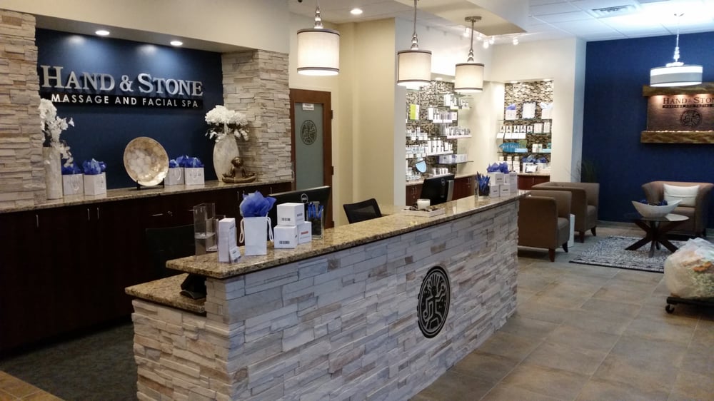 Hand & Stone Massage and Facial Spa Logo