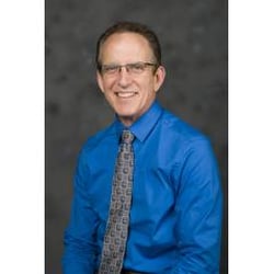 Ontario Hearing Centers - Dr.JohnMcNamara_SoloDarkBack
