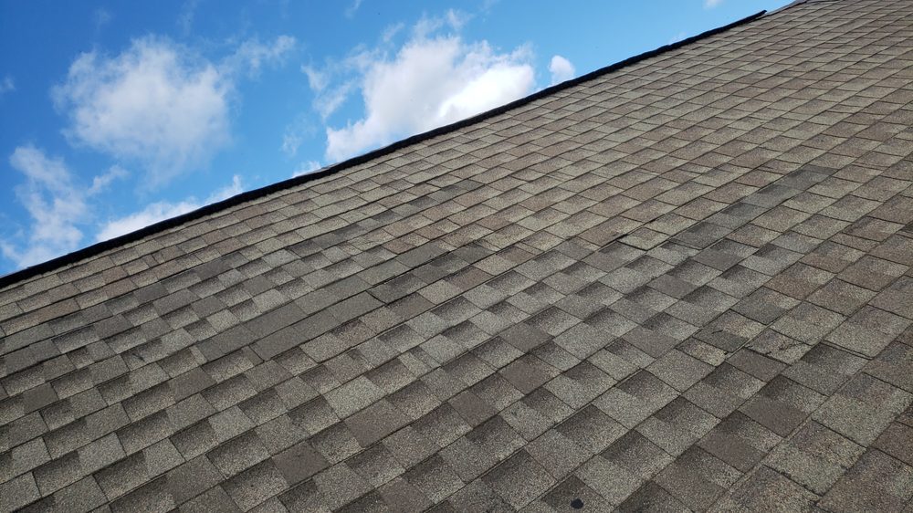 Slide of CMS Roofing