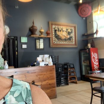 Dagon - Burmese decor against the charcoal walls gives this small space a cozy, authentic feel. - Burmese Near Me - Honolulu, Hawaii Dagon - Burmese decor against the charcoal walls gives this small space a cozy, authentic feel. - Burmese Near Me - Honolulu, Hawaii