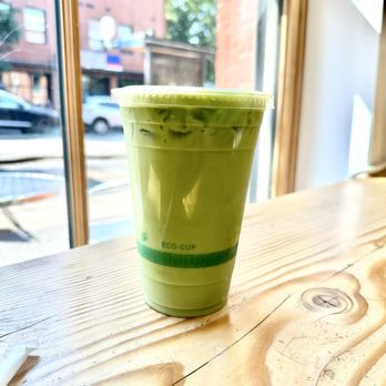 Just Matcha - iced strawberry matcha latte with oat milk and a seat at the counter with a view of pandora street - Tea Rooms Near Me - Victoria, British Columbia Just Matcha - iced strawberry matcha latte with oat milk and a seat at the counter with a view of pandora street - Tea Rooms Near Me - Victoria, British Columbia