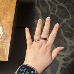 Gel X nails with off white French done by Bui
