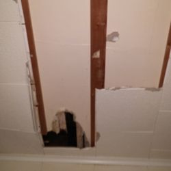 Miller Properties - The hole that was made from the upstairs neighbors flooding the apartment above us last September. To this day, the hole still is not fixed.