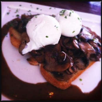 Inwood Local - Sautéed mushrooms toast with poached eggs - Bars Near Me - New York, New York