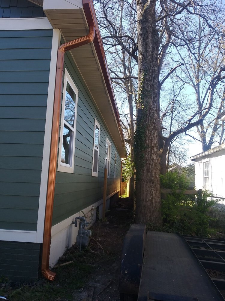 Slide of EW Roofing & Gutters