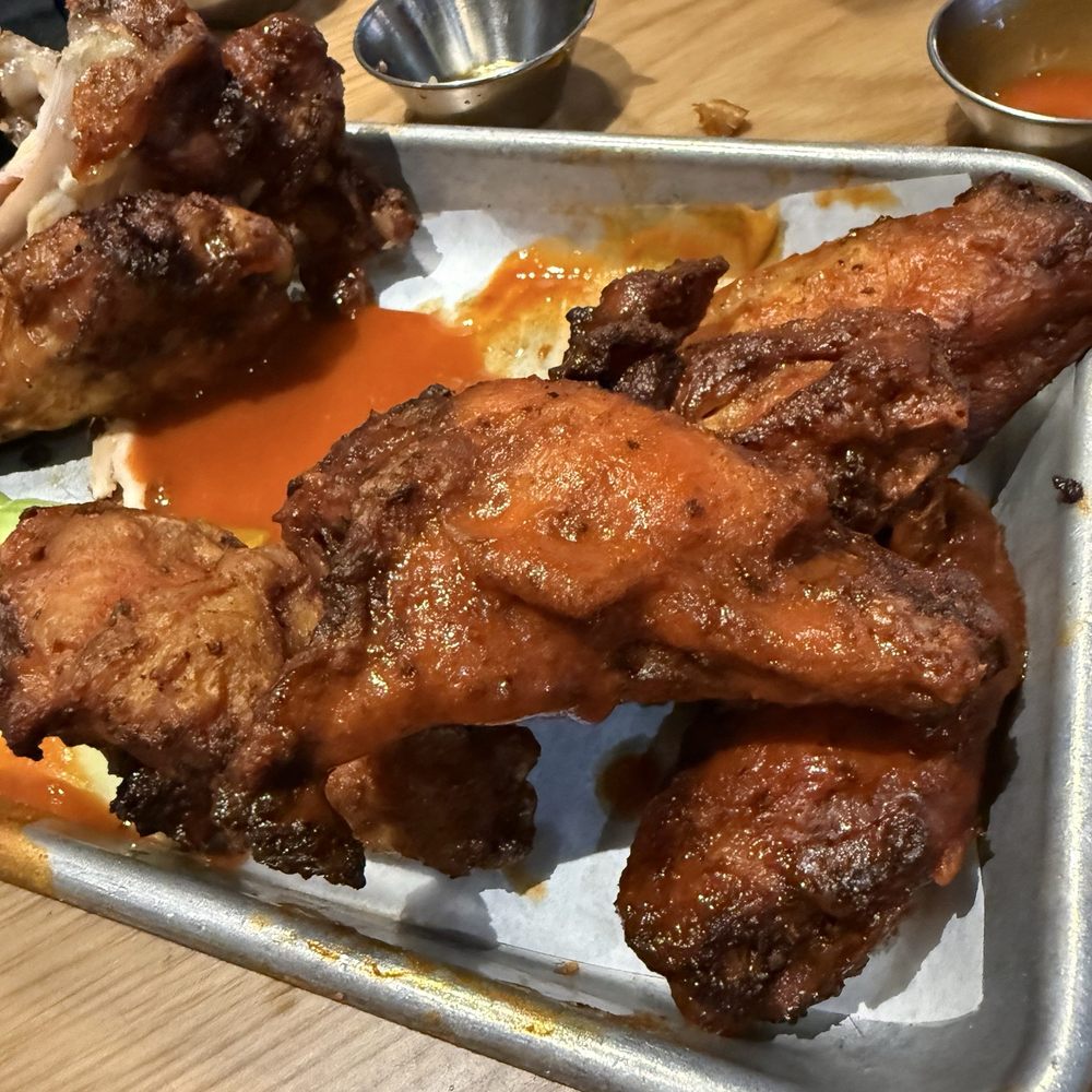 Dry and burnt on the ends with zero flavor of buffalo sauce, it had all seeped down to the bottom of the plate
