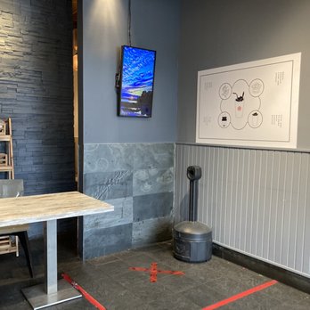 Shuyi Tealicious - a room with a table and chairs - Taiwanese Near Me - Mississauga, Ontario