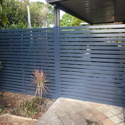 Hire Some Help - Parkinson, Slat fence with single gate in Mountain Blue colour. For more pictures www.hiresomehelp.com.au