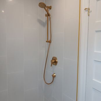 TradeMaster - Completed tile and shower head - General Contractors Near Me TradeMaster - Completed tile and shower head - General Contractors Near Me