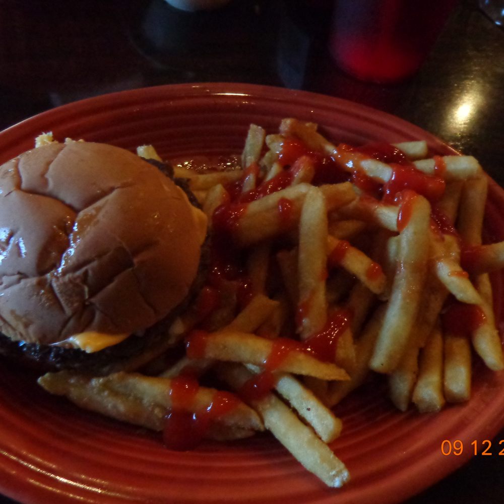 Hamburger and fries from childrens menu if ordered by an adult it is $1.95 more Hamburger and fries from childrens menu if ordered by an adult it is $1.95 more
