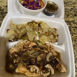 Mel's Blueplate Express - Smothered Chicken Breast with mushrooms and gravy. Got cabbage as a side. Good flavor but a little dry