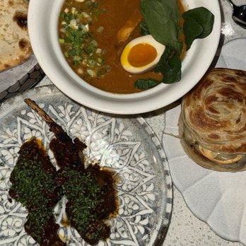 Kitchen Rumors - Grilled Gossip Lamb Chop, Paratha Smash Burger, Butter Chicken Ramen, and Chili Cheese Kulcha - Indian Near Me - Houston, Texas Kitchen Rumors - Grilled Gossip Lamb Chop, Paratha Smash Burger, Butter Chicken Ramen, and Chili Cheese Kulcha - Indian Near Me - Houston, Texas