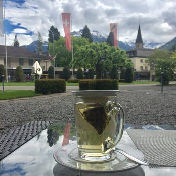 Lindner Grand Hotel Beau Rivage - Complimentary afternoon tea on the outside patio. - Hotels Near Me - Interlaken, BE