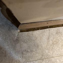 Shelby Design Center - Notice the uneven cut in the tile and the huge gap