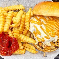 Buenos Dias Burger. Bacon, hashbrowns, american cheese egg and chipotle mayo. ,