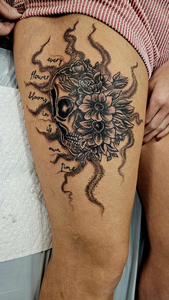 Stained By Kane Tattoo Studio Logo