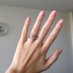 Kj Watch & Jewelry Repair - After: wedding band has been widened and now my e-ring fits perfectly inside. Yay!