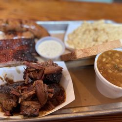 The Joint - 3 meat platter. Ribs, burnt ends, sausage with a side of Mac and beans