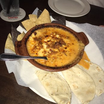 Yard House - Featured - Queso Dip with bacon chorizo - Bars Near Me - Dedham, Massachusetts Yard House - Featured - Queso Dip with bacon chorizo - Bars Near Me - Dedham, Massachusetts