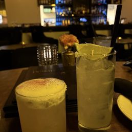 Drink on the left: i dont recall the name but it was a reposado margarita with foam.  Drink on the right: House margarita