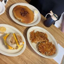 Baconator cakes, hash browns, & Sausage breakfast sandwich