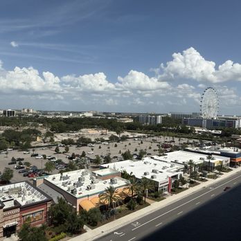Tom’s Watch Bar - View of the iDrive wheel and Helios resort towards the left. - Sports Bars Near Me - Orlando, Florida Tom’s Watch Bar - View of the iDrive wheel and Helios resort towards the left. - Sports Bars Near Me - Orlando, Florida