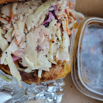 Frazie's Meat & Market - The Hoss (pulled pork, coleslaw - omitted the pimento cheese) with a side of collard greens - view from under the bun - Butcher Near Me - Atlanta, Georgia
