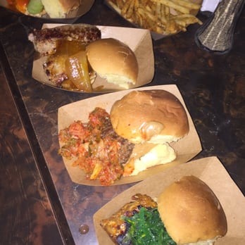 Green Dot Stables - Cajun fries, mystery meat, Korean, Buffalo Chicken, and Tempeh - Bars Near Me - Detroit, Michigan